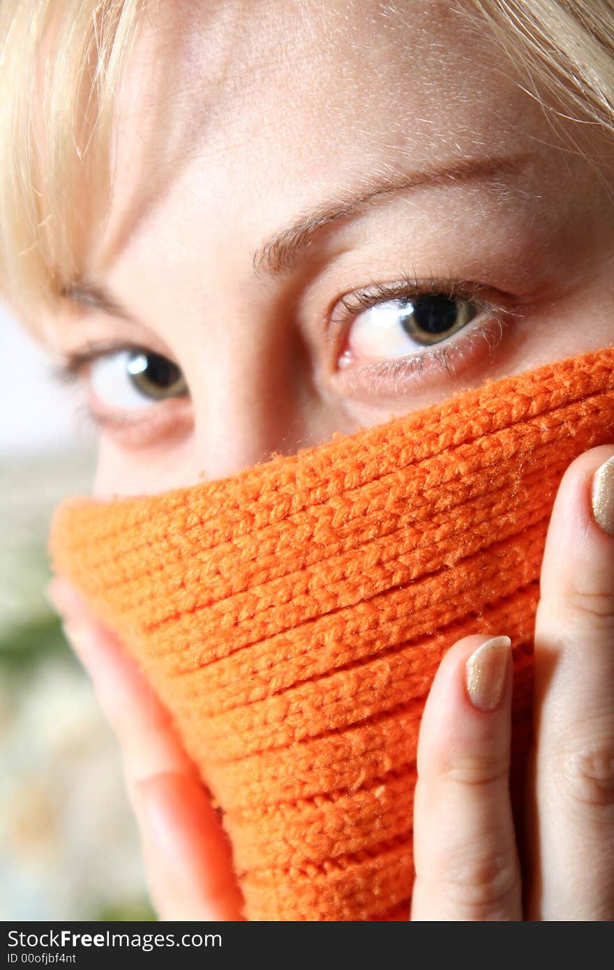 Beautiful girl in orange scarf