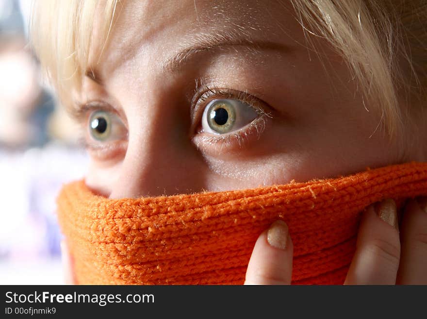 Beautiful girl in orange scarf