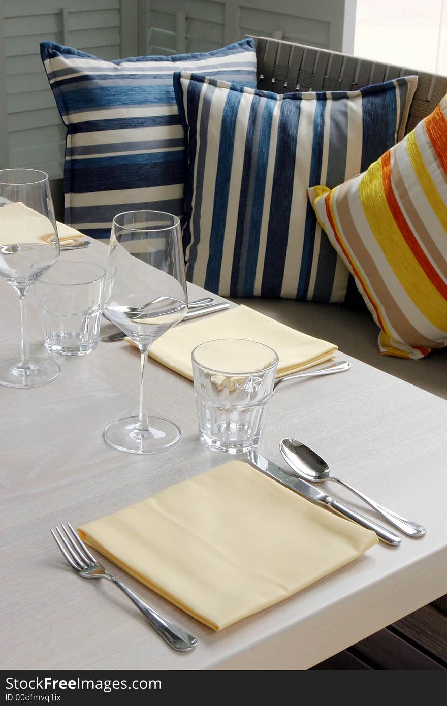 Close-up of an elegant table setting. Close-up of an elegant table setting.