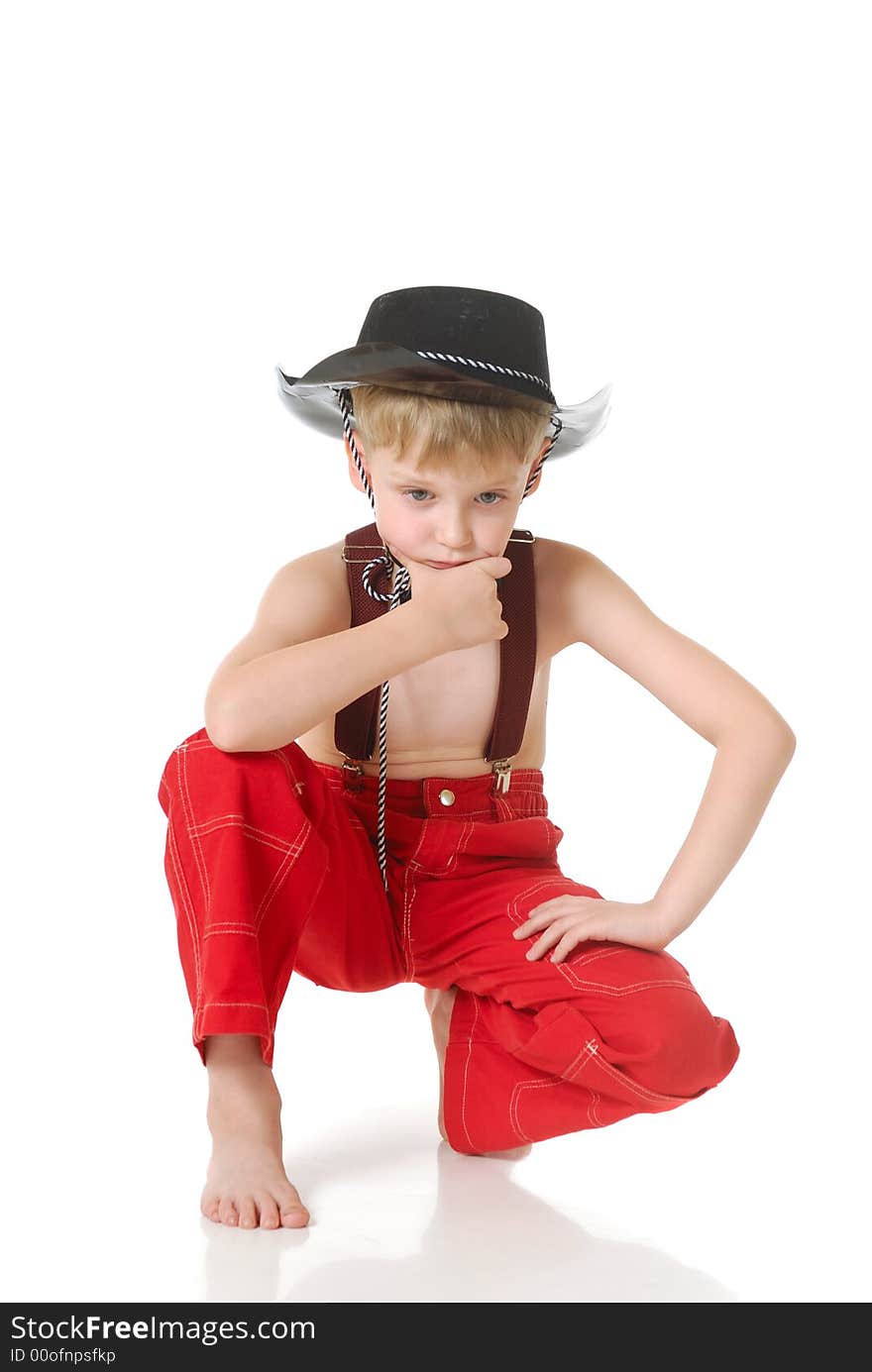 The boy in clothes of cowboy