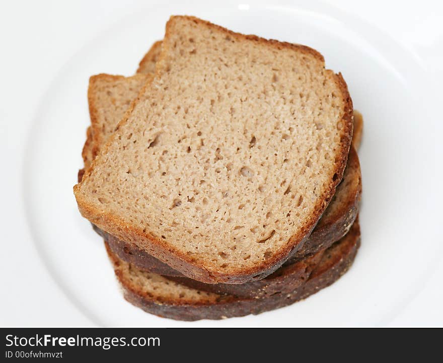 Pieces of bread on the white background