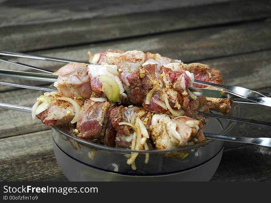 Fresh pork kebab with onion in the pan 8. Fresh pork kebab with onion in the pan 8