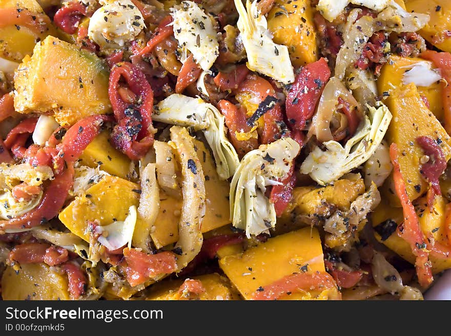 Gourmet salad dish of roasted red peppers, pumpkin, artichokes and eggplant, topped with herbed crumbs. Gourmet salad dish of roasted red peppers, pumpkin, artichokes and eggplant, topped with herbed crumbs