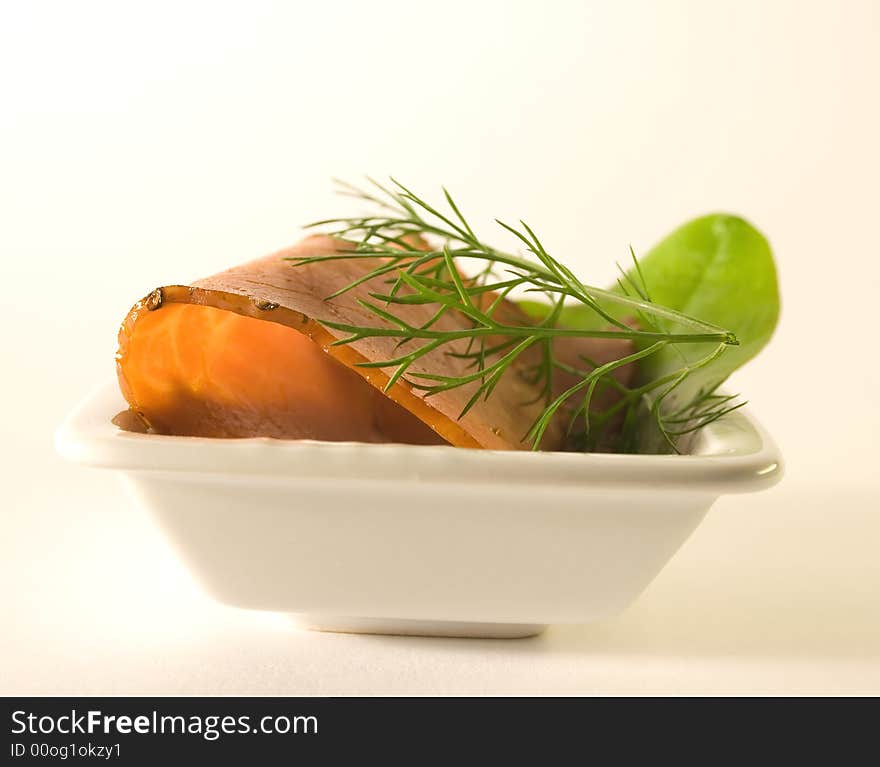 Meat slicing in the white plate over white background. Meat slicing in the white plate over white background