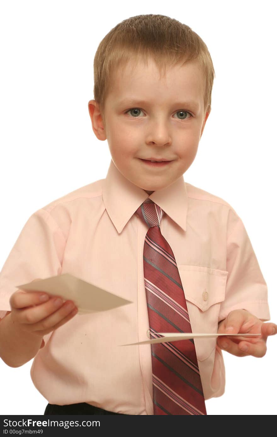 The happy boy holds in a hand an envelope with the letter on a white background