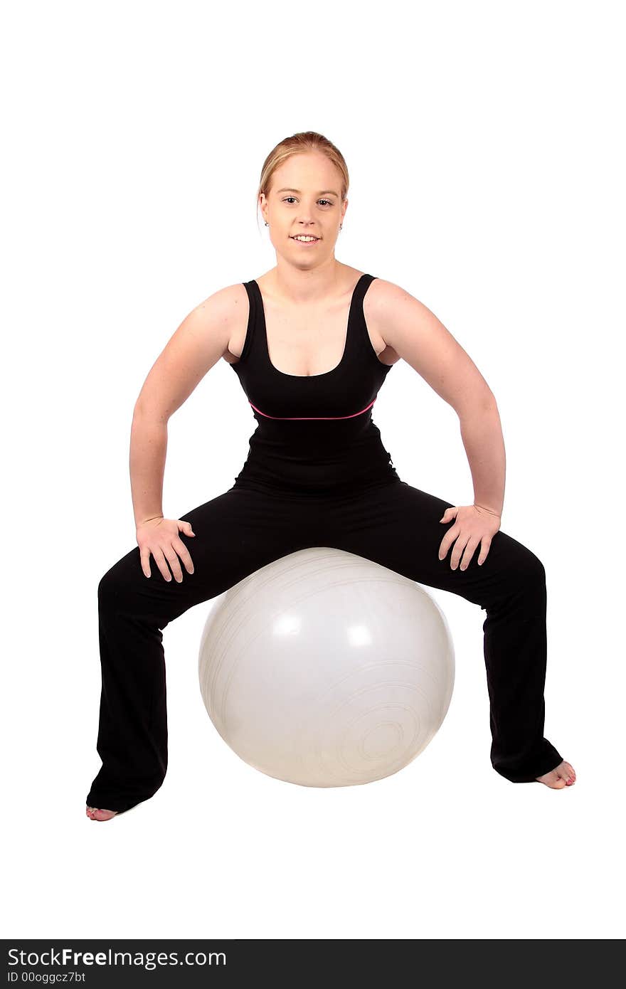 Balancing on a flex ball to strengthen the muscles