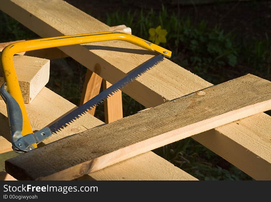 Still life of saws and lumber. Still life of saws and lumber