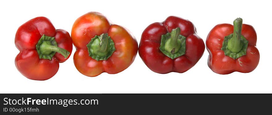 Red peppers over white background