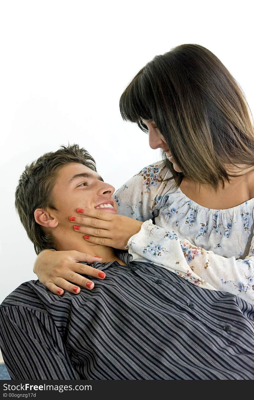 Girl holding her boyfriend in her arms. Girl holding her boyfriend in her arms