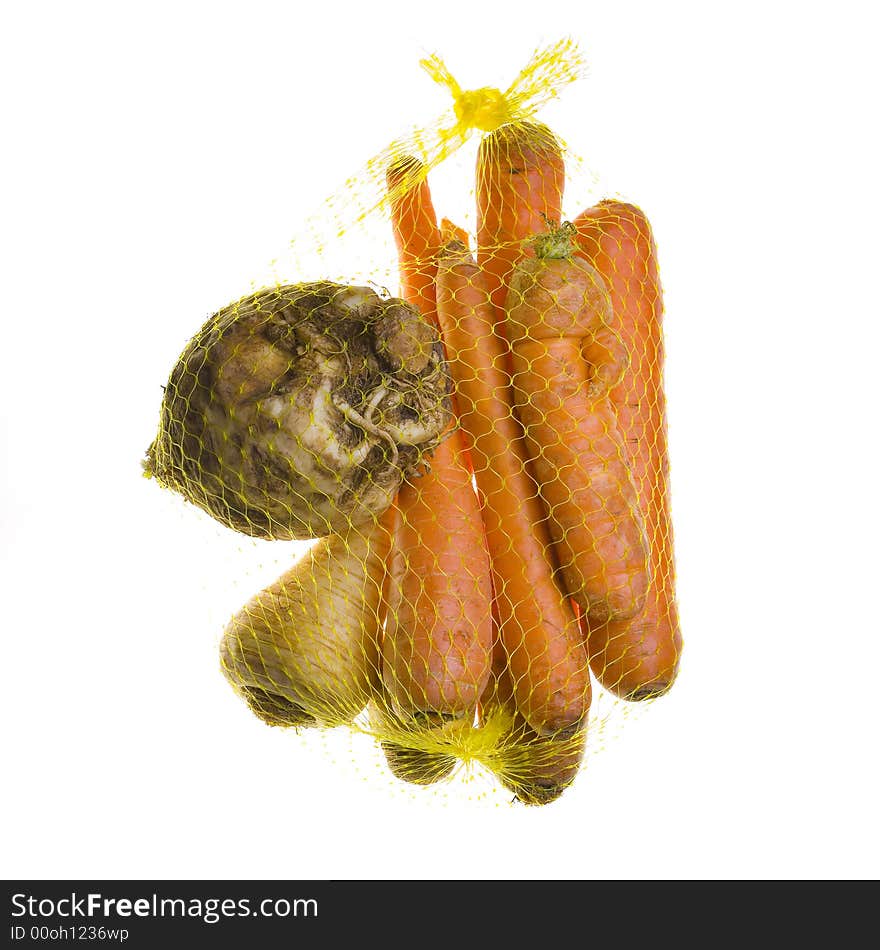 Bag of vegetables, celery, parsnip and carrot, as stock soup vegetables. Bag of vegetables, celery, parsnip and carrot, as stock soup vegetables