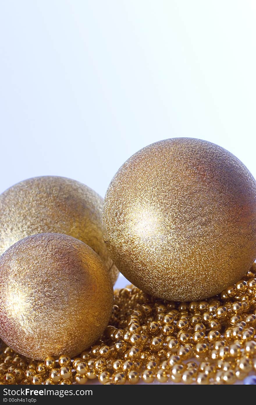 Gold Christmas balls and pearl