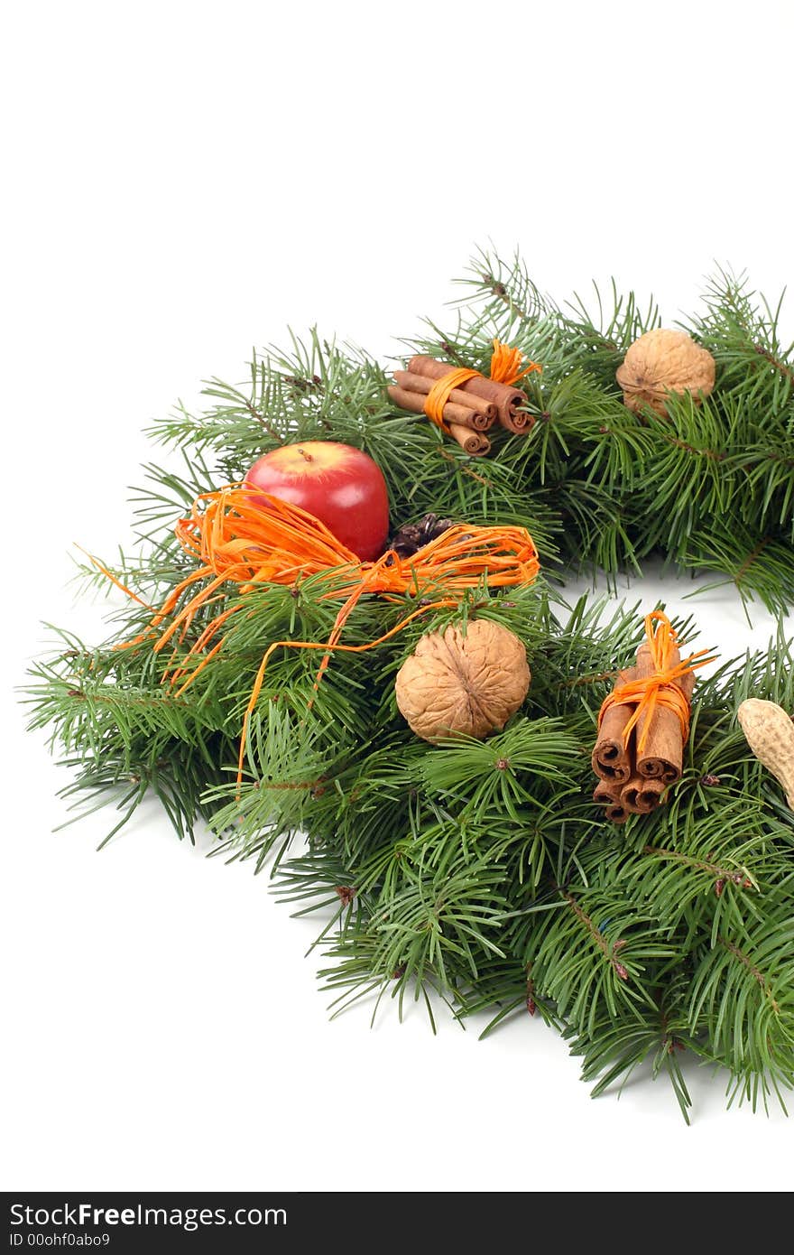 Advent wreath with nuts, cinnamon, apple