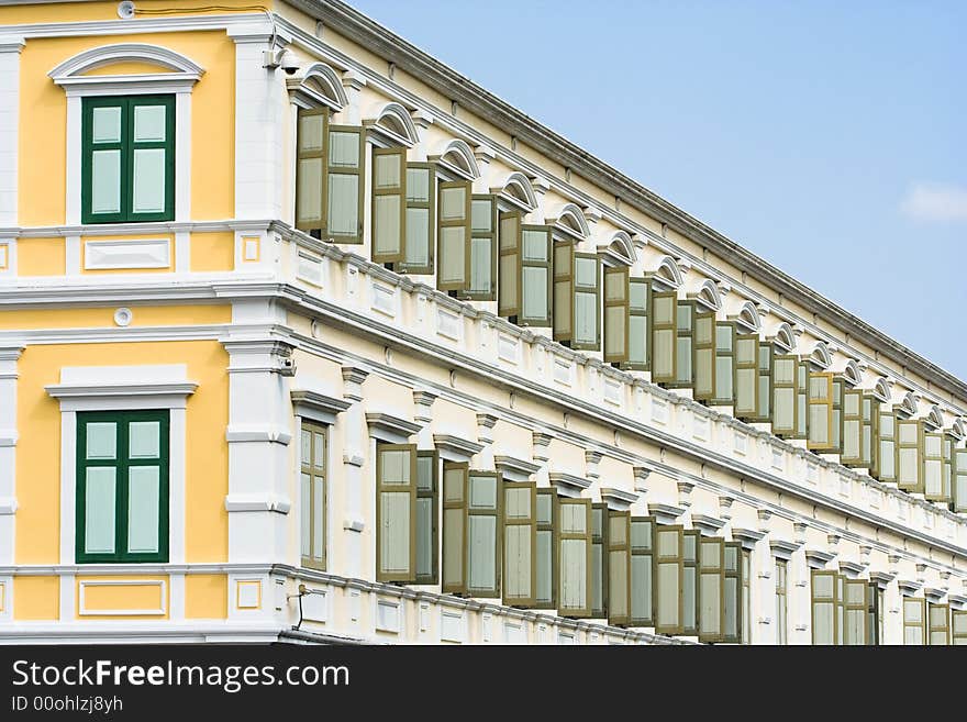 Painted windows and designed wall with blue sky