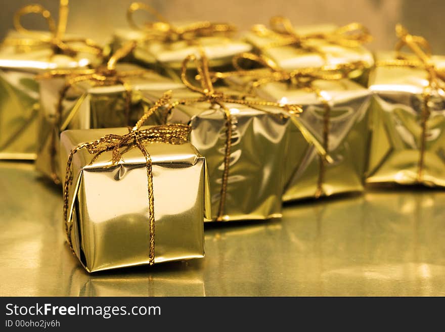 Stack Of Golden Gift Boxes