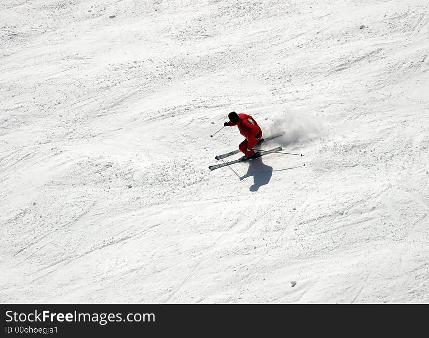 The Skier  in the mountains