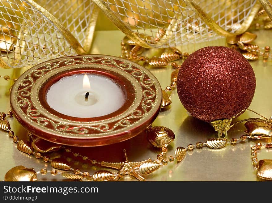 Festive new-year candle and Christmas ball