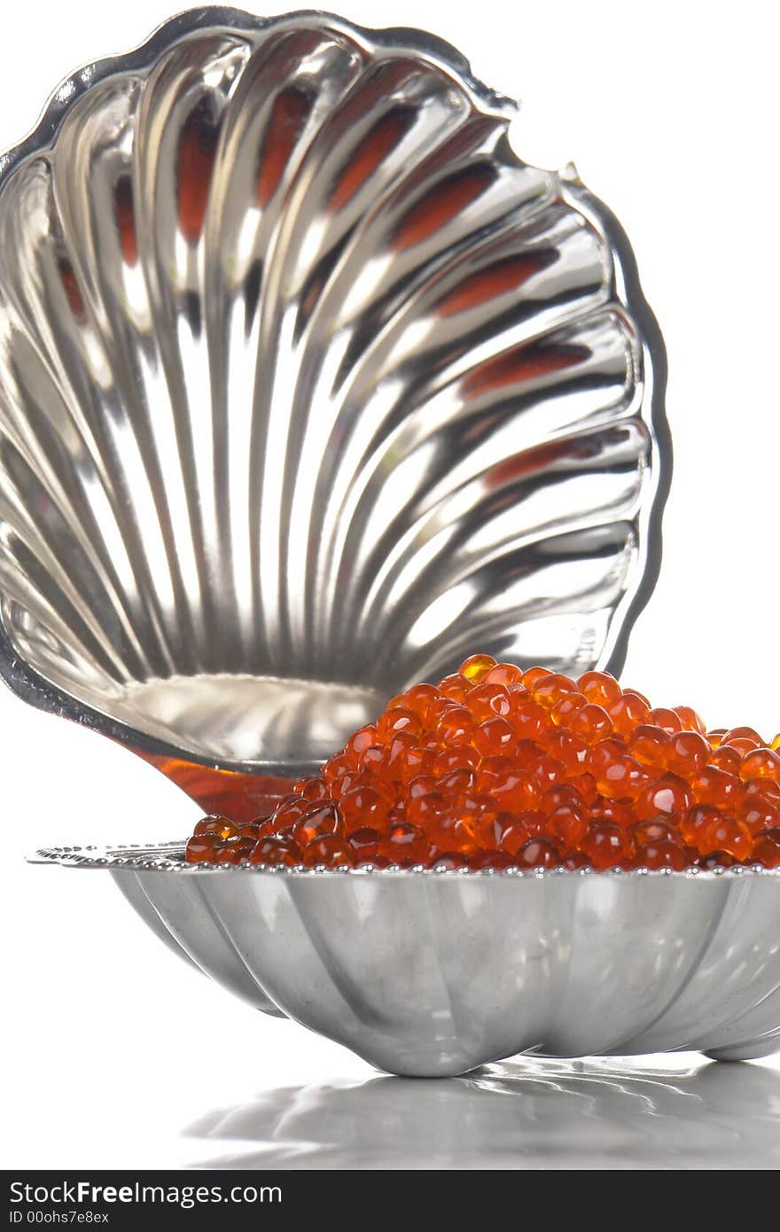 Red caviar on a white background