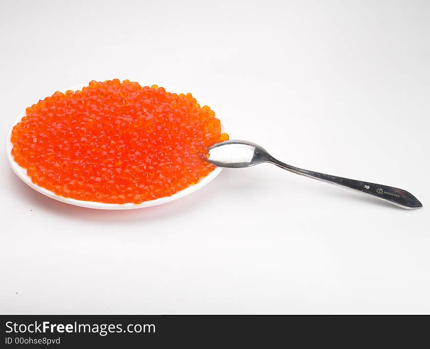 Red caviar on a white background