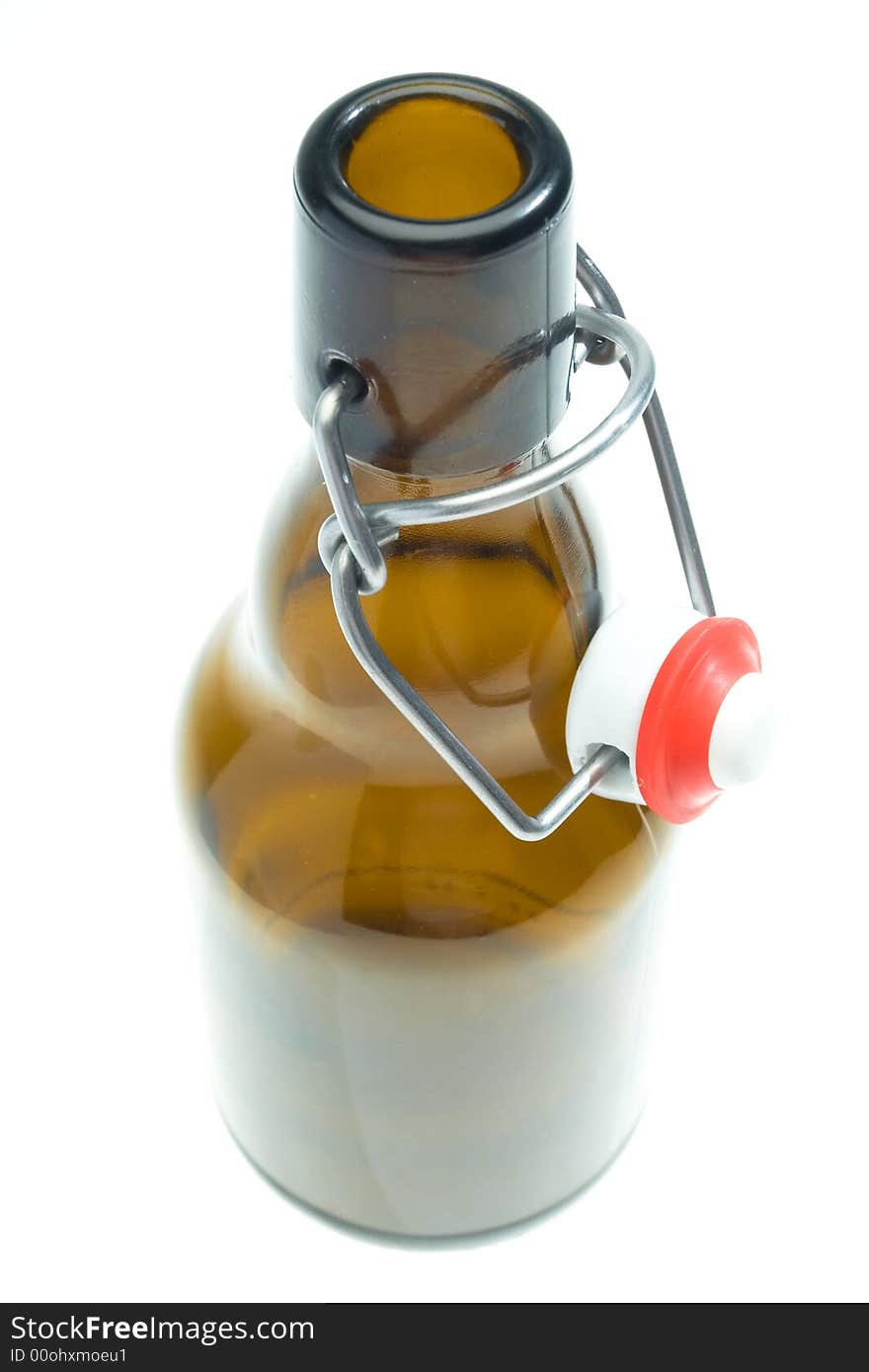 Glass beer bottle on white background