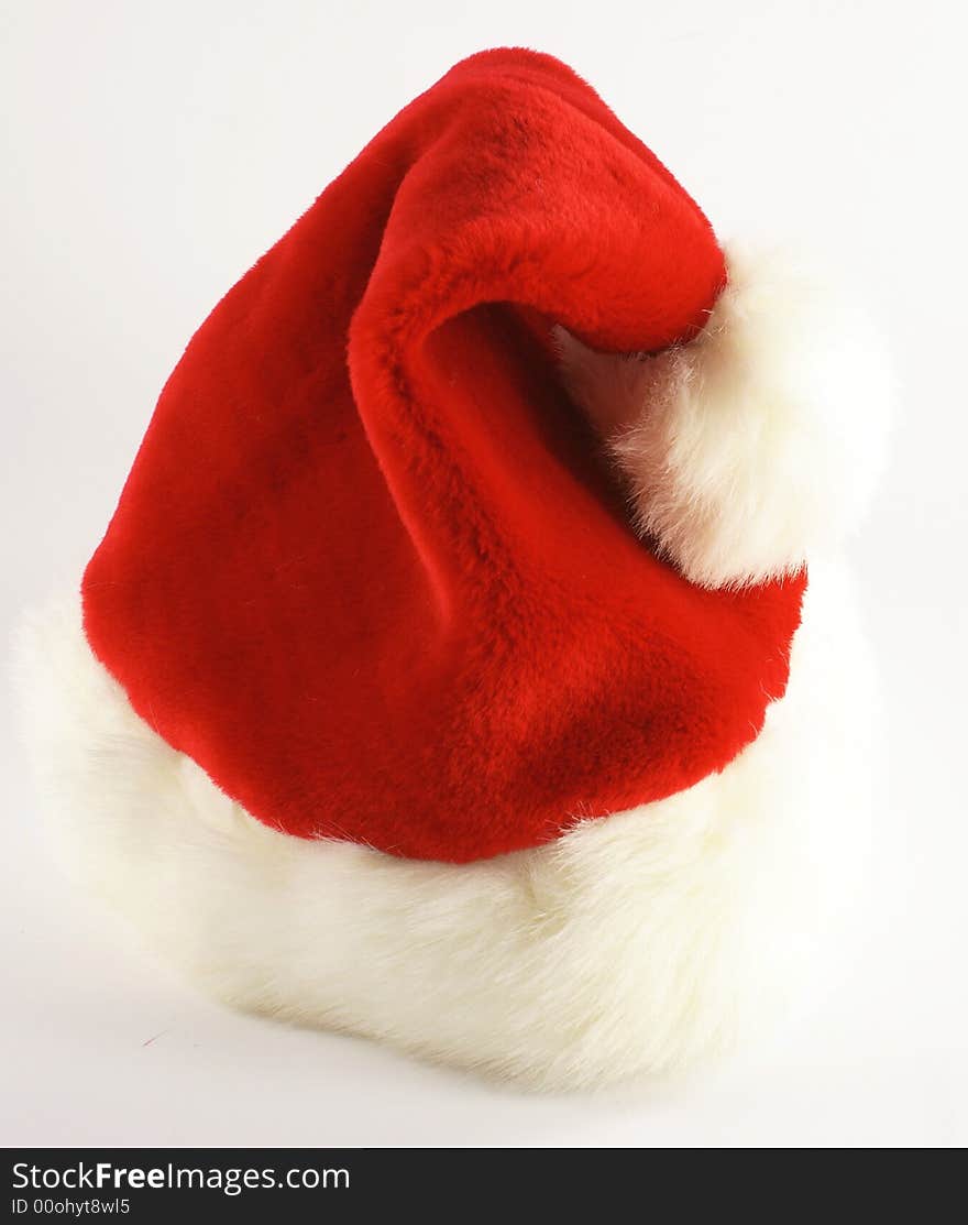 Santa's red cap isolated on white