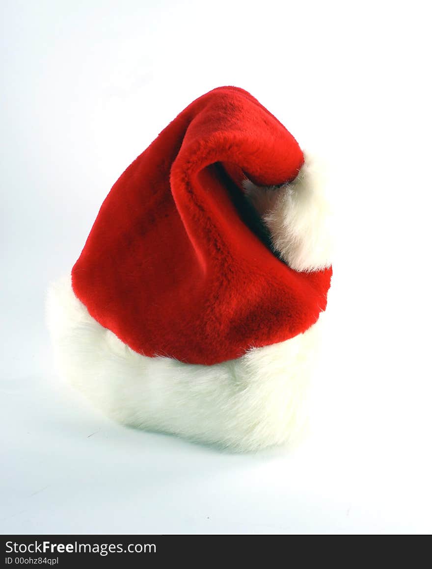 Santa's red cap isolated on white