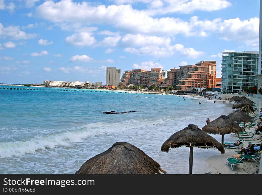 A view of ocean ,beach and umbrellas. A view of ocean ,beach and umbrellas