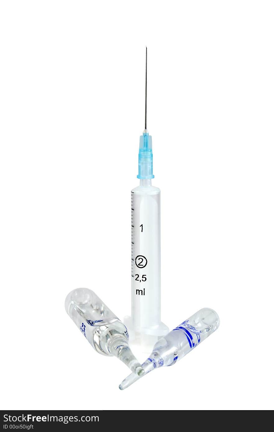 The syringe and two ampoules are photographed on a white background