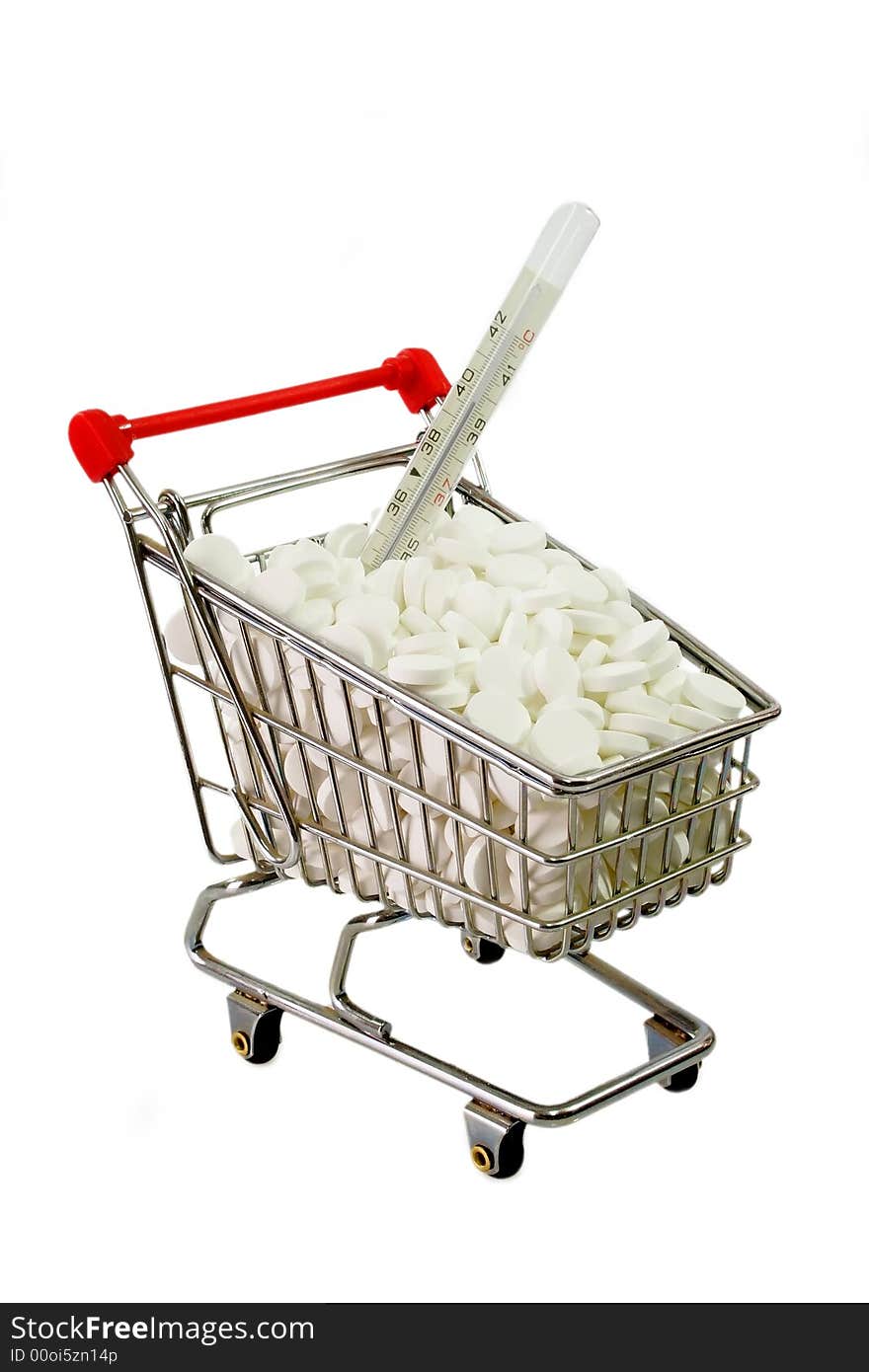 White pills in a trolley isolated on white background. White pills in a trolley isolated on white background