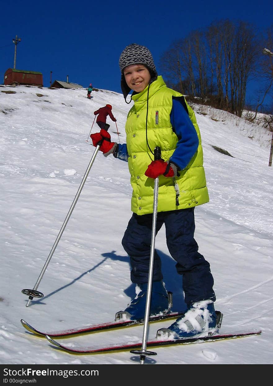 Young boy on mountain skies. Young boy on mountain skies