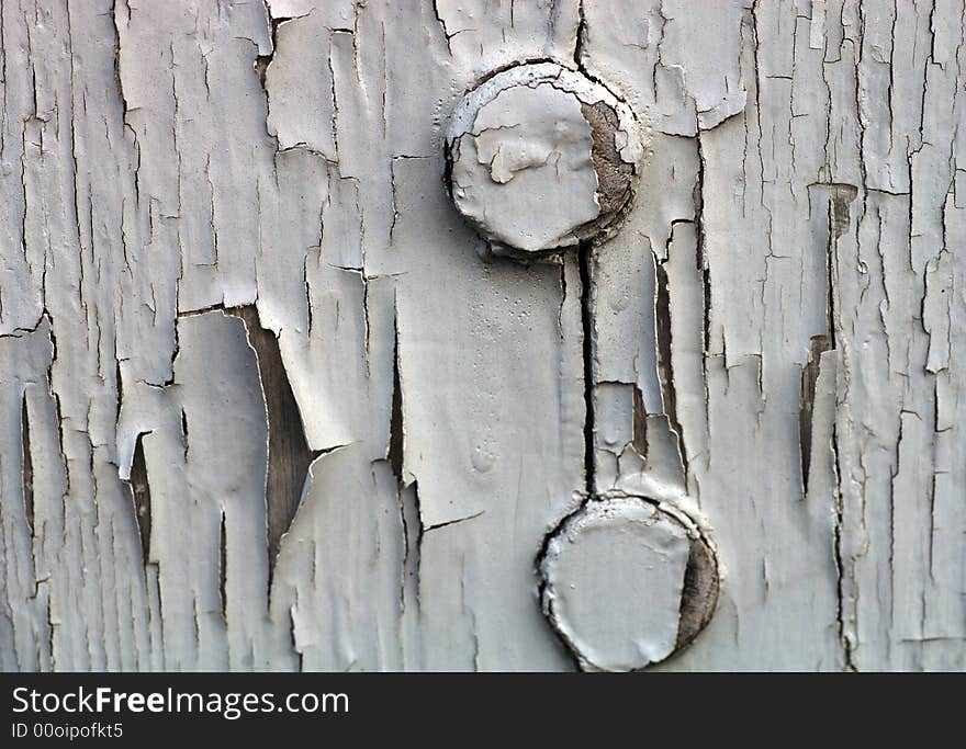 Close up image of a vintage cracked paint surface