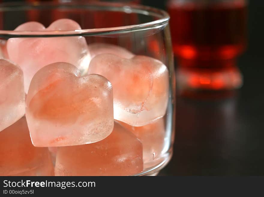 Pink heart shaped ice cubes and cocktails. Pink heart shaped ice cubes and cocktails