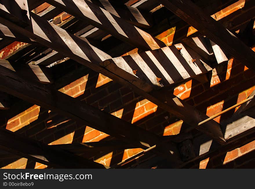 Interesting Background image of shadows from sunlight through wood floor. Interesting Background image of shadows from sunlight through wood floor