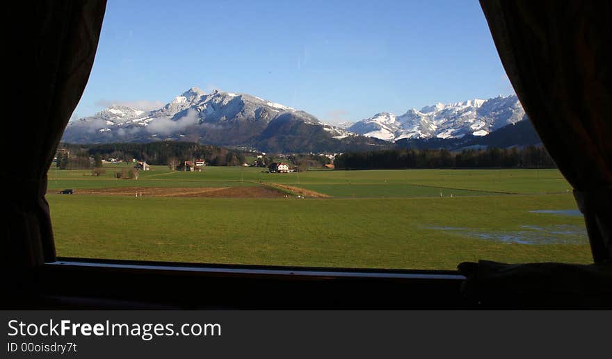 Look the swiss Alps in a train. Look the swiss Alps in a train