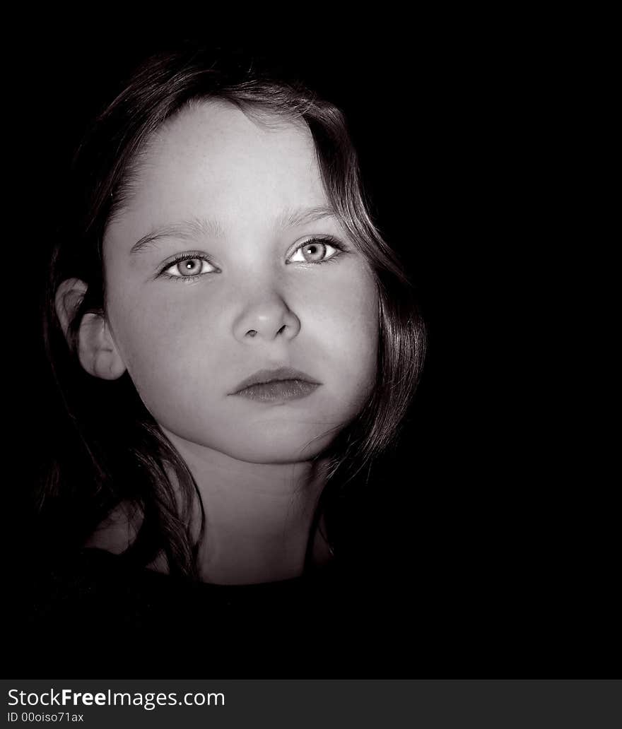 Portrait of a young beautiful girl on Black. Portrait of a young beautiful girl on Black