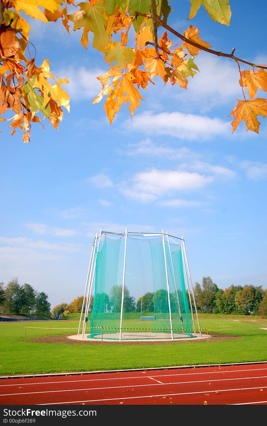 Area for javelin and hammer throwing on the athletics field. Surrounded by autumn leafs. Area for javelin and hammer throwing on the athletics field. Surrounded by autumn leafs