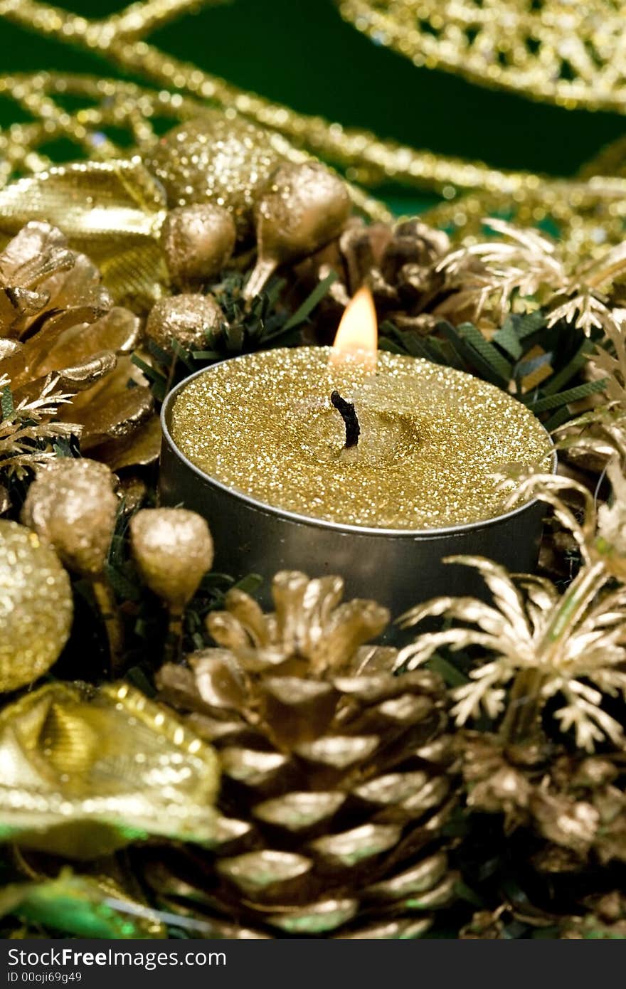 Golden candle and celebration decoration