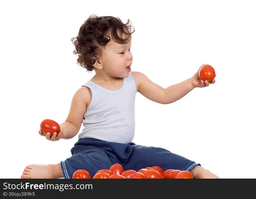 Child with tomato,isolated on a white background. Child with tomato,isolated on a white background.
