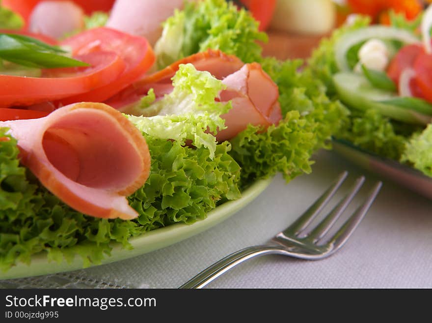 Fresh Salad With Onion Tomato And Basil