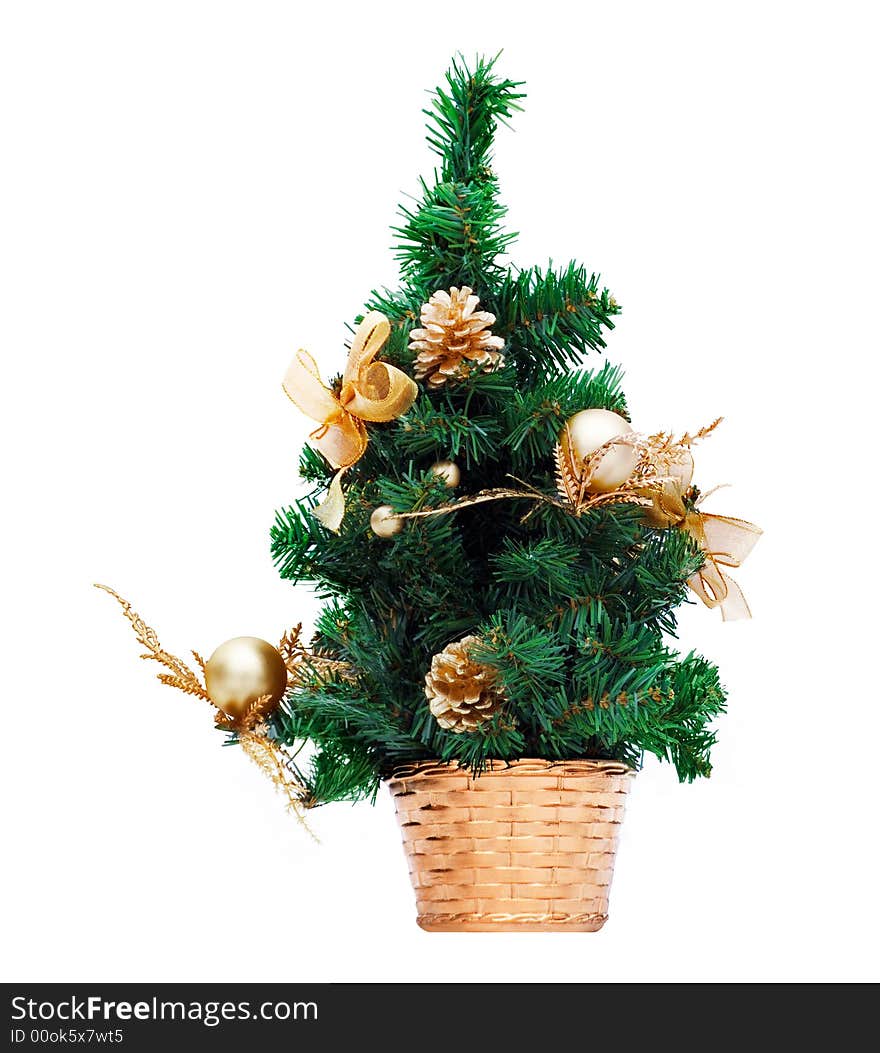 Artificial christmas fur-tree in плетеной to a basket on a white background