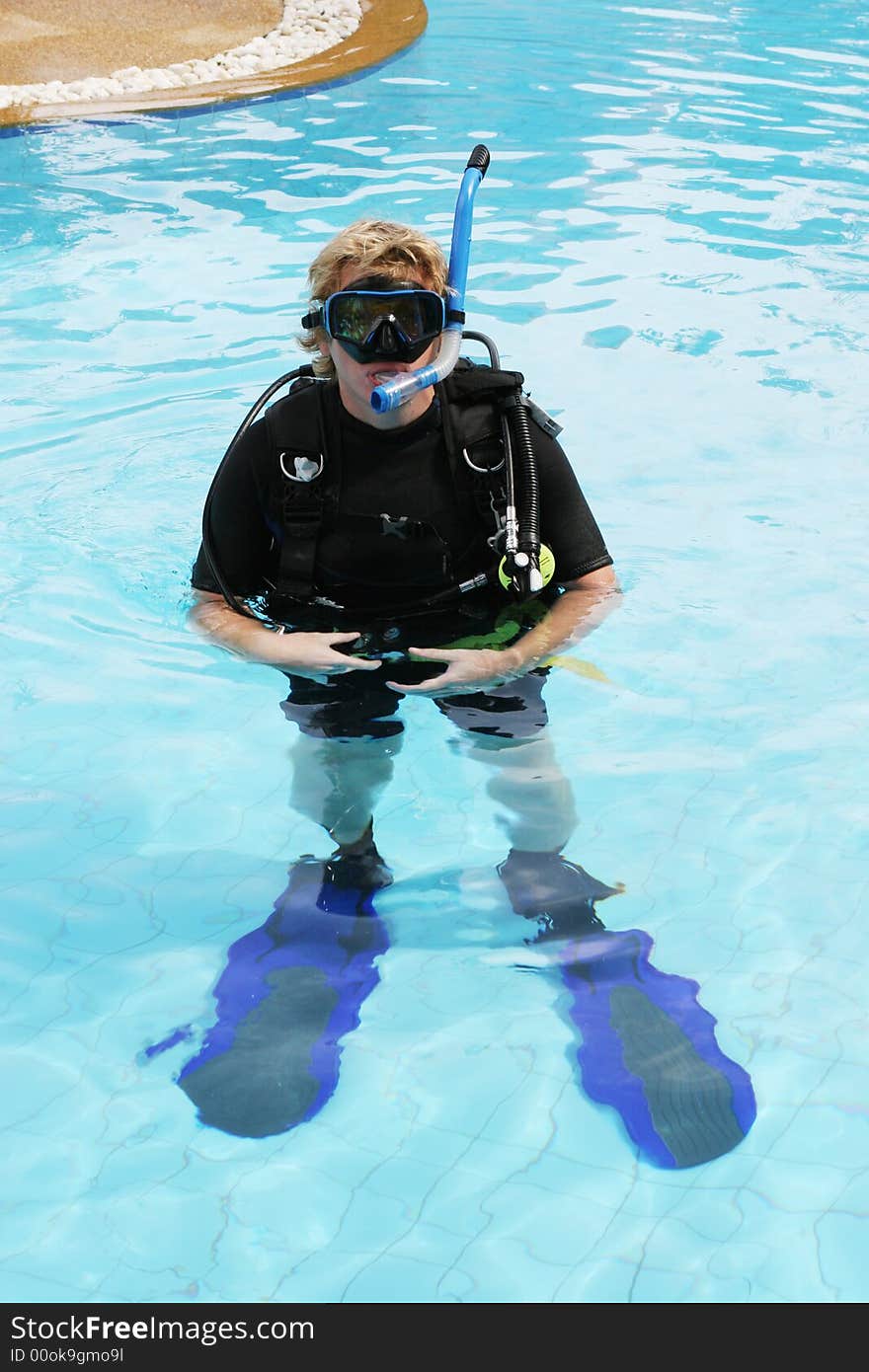 Scuba diver in the swimming pool.