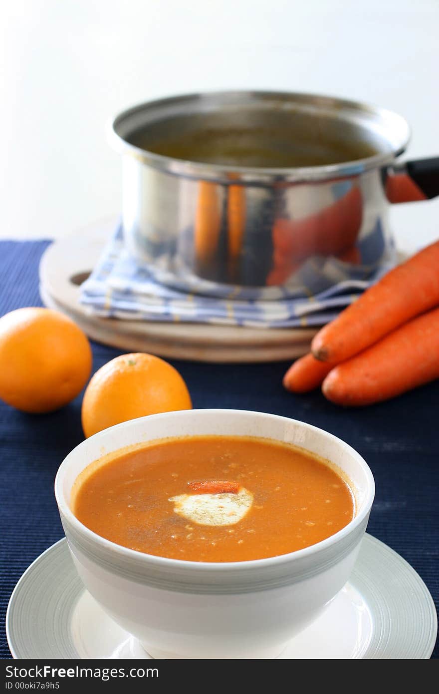 Carrot and orange soup with a dollop of creamy yogurt and sprinkle of thyme