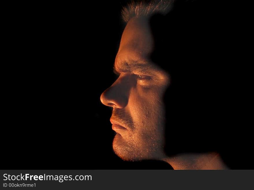 Face of man in the dark night