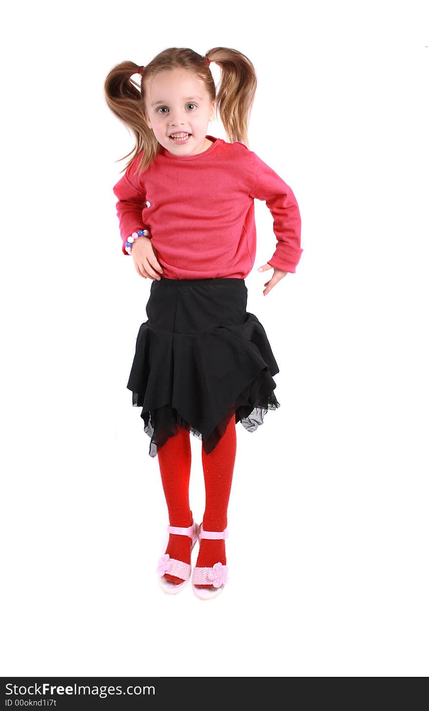 Young girl in red on the white background