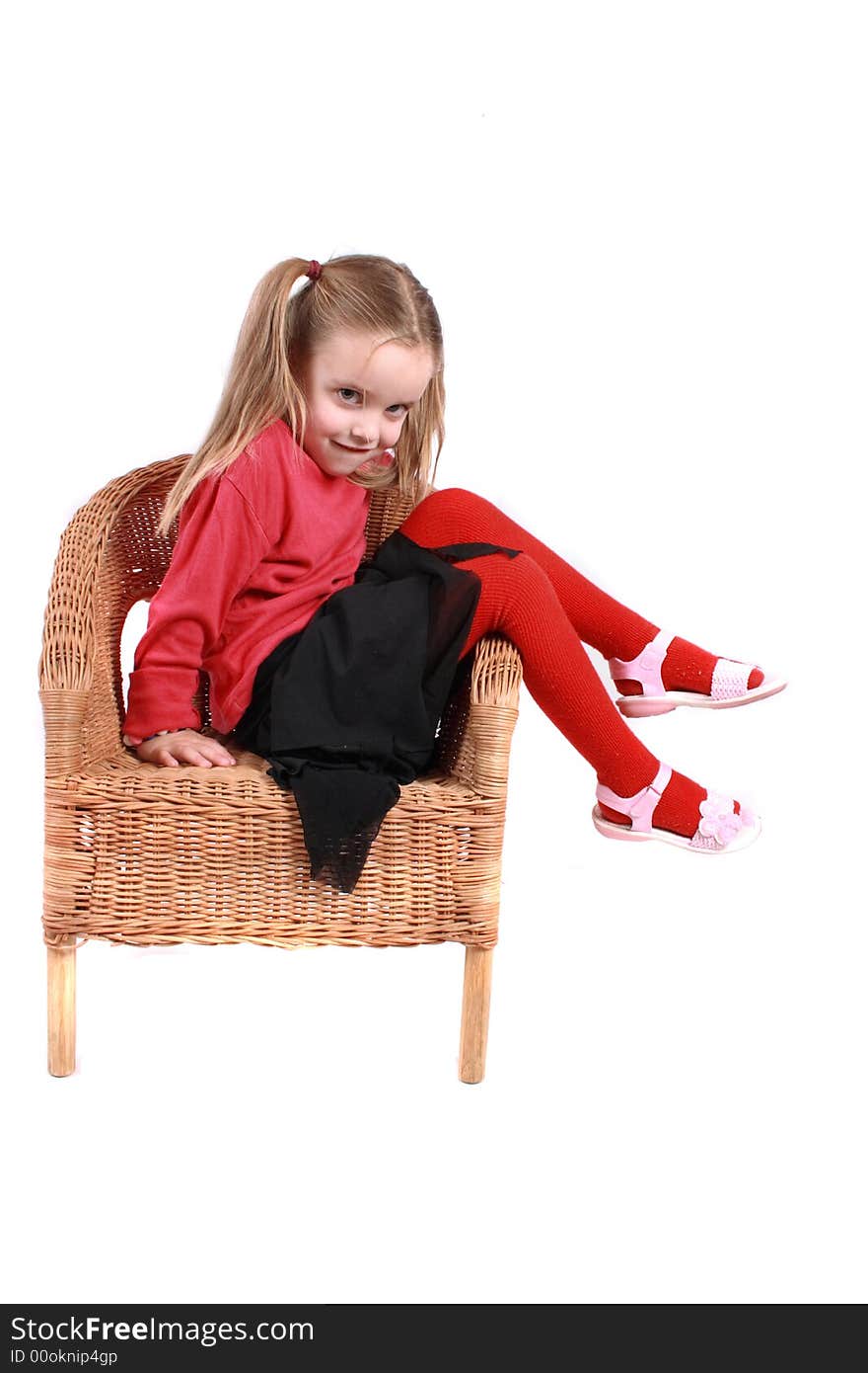 Young girl in red on the white background