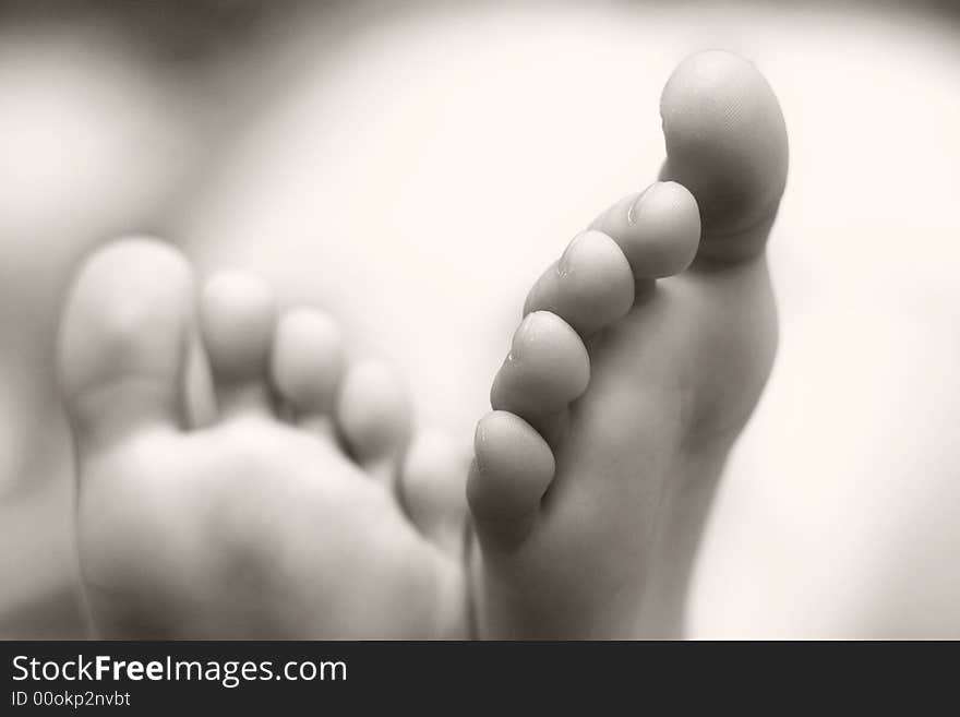 An image of little foots of sleeping baby