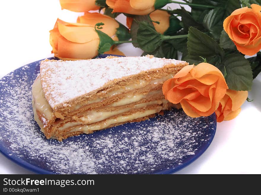 Sweet desert and rose on the white background