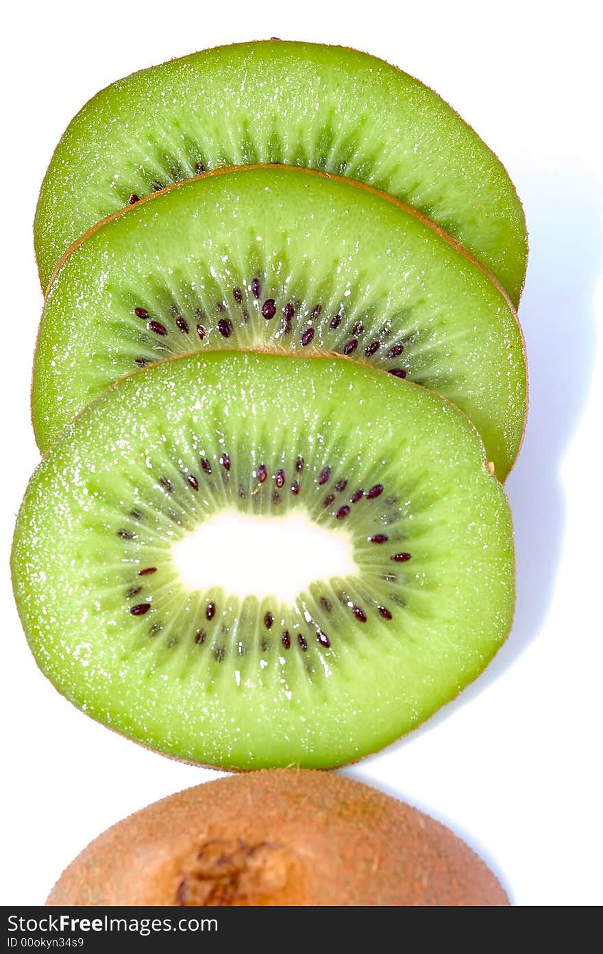 Kiwi slices isolated on white background. Kiwi slices isolated on white background