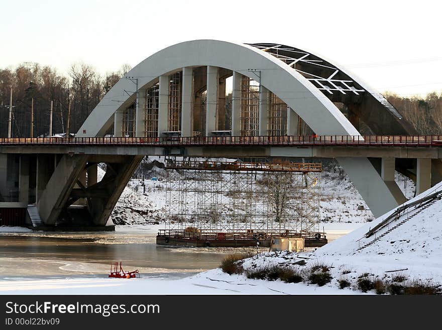 Winter bridge throw the river