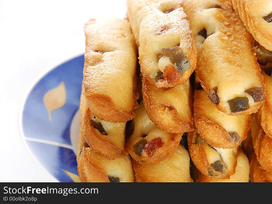 Tasty fruit cakes on a plate