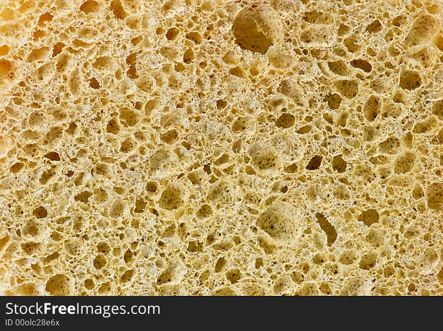 Extreme closeup of a yellow sponge. Extreme closeup of a yellow sponge